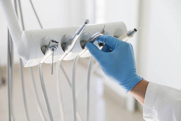 Professional Emergency Dentist technician working in Tiffin, IA
